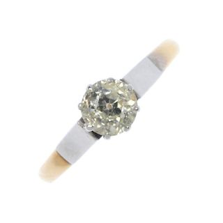 A mid 20th century 18ct gold and platinum diamond single-stone ring. The old-cut diamond, to the tap