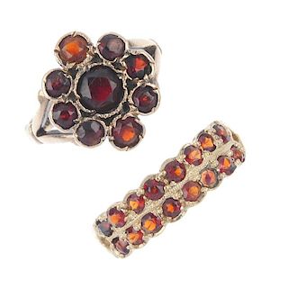 A selection of three 9ct gold garnet rings. To include a circular-shape garnet cluster ring, a circu