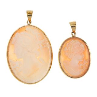 Two shell cameo pendants. Each designed as an oval shell, carved to depict a lady in profile, within