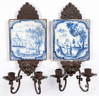 Pair of wrought iron and delft tile candle sconces