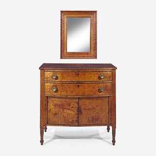 A Federal carved tiger maple bowfront dressing table together with tiger maple mirror early 19th century