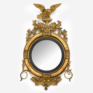 A Classical carved and giltwood girandole mirror circa 1820