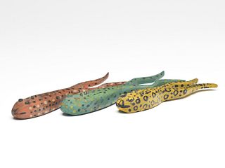 A match set of three vintage frog decoys from Michigan.