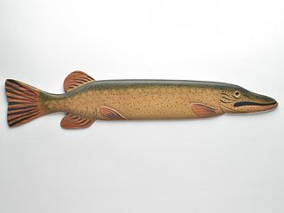 Northern pike fish plaque made in the style of Oscar Peterson, with carved eye, mouth, fins, and tail.