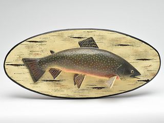 Carved wooden brook trout on wooden backboard, Lawrence Irvin, Winthrop, Maine.