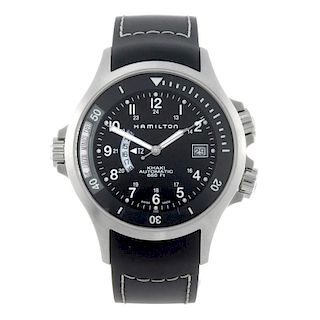 HAMILTON - a gentleman's Khaki GMT wrist watch. Stainless steel case with exhibition case back. Numb