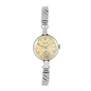 MOVADO - a lady's bracelet watch. Stainless steel case. Signed manual wind movement. Silvered dial w