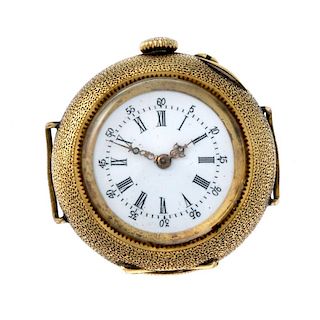 A pocket watch converted into a watch head. Yellow metal case with enamel decoration to case back, s