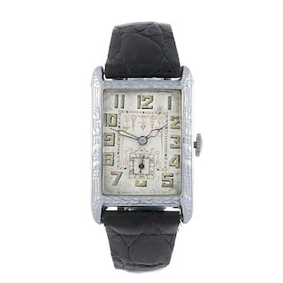 M.BEGUELIN - a gentleman's wrist watch. Nickel plated case. Signed manual wind movement. Silvered di