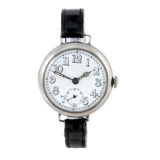 A gentleman's trench style wrist watch. White metal case, stamped 0.875 with poincon. Numbered 19026