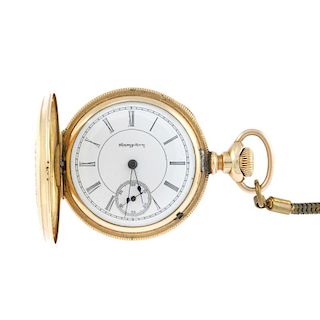 A full hunter pocket watch by Hampden. Gold plated case. Signed keyless wind movement with club toot