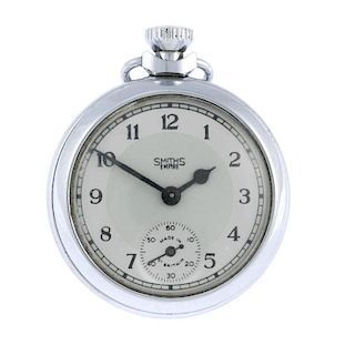An open face pocket watch by Smiths. Base metal case. Unsigned keyless wind movement. Two-tone silve