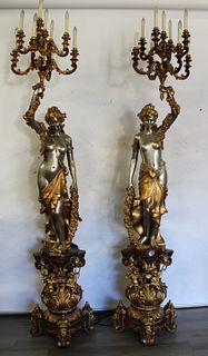 A Large Pair Of Bronze Figural Candelabra.