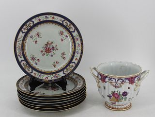 8 Porcelain Plates & A  Porcelain Urn.