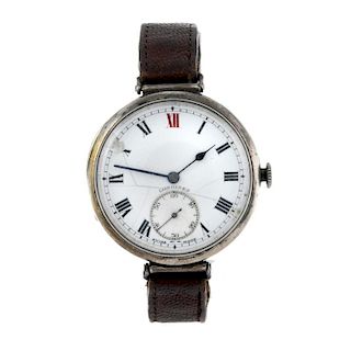 LONGINES - a gentleman's trench style watch. Silver case, import hallmark London 1931. Signed manual