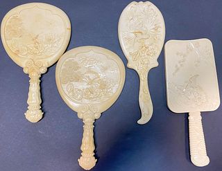 Four Celluloid Hand Mirrors