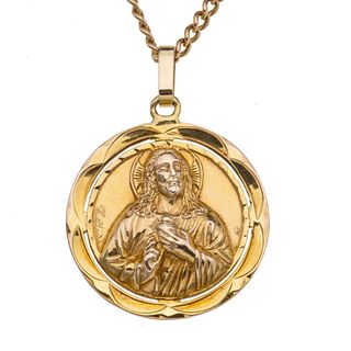 Collar y medalla en oro amarillo de 10k y 14k de la firma Cellini. Imagen de la Virgen de Guadalupe y del Sagrado corazón de Jesús.