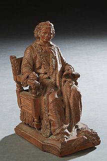 Terracotta Figure, 19th c., of a gentleman seated in an armchair, on an integral rectangular base, H.- 11 in., W.- 5 1/2 in., D.- 7 in. Provenance: Pa