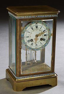 French Champleve and Bronze Anniversary Clock, early 20th c, by Japy Freres, the glass sided case over a painted enamel dial time and strike clock, wi