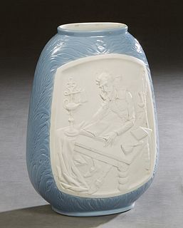 Lladro Porcelain Don Quijote Baluster Vase, 20th c., one side with a biscuit reserve of him and Sancho Panza, the other with him as an author, H.- 11 