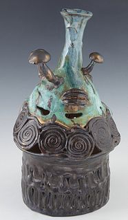 Unusual American Glazed Pottery Vase, 20th c., with relief applied decoration and pierced sides, possibly North Carolina, H.- 14 1/2 in., Dia.- 7 3/4 
