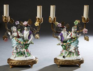 Pair of German Style Porcelain Figural Two Light Lamps, c. 1930, with dancing couples, on pierced oval brass plated bases, H.- 12 in., W.- 8 in., D.- 