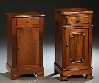 Near Pair of French Louis Philippe Carved Walnut Nightstands, 19th c., one with a stepped edge canted top over a frieze drawer, and a long cupboard do
