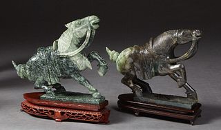 Pair of Chinese Carved Green Jade Horses, 20th c., on carved mahogany bases, Tallest- H.- 9 in., W.- 11 in., D.- 3 in. Provenance: Palmira, the Estate