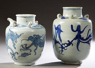 Two Chinese Porcelain Baluster Oil Jars, each with four applied ring handles and a spout, with blue dragon decoration., Largest- H.- 14 1/2 in., Dia.-