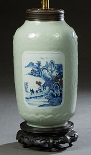 Chinese Celadon Porcelain Baluster Vase, early 20th c., with relief decoration and two scenic blue landscape reserves, now on a carved mahogany base a