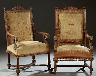 Near Pair of French Carved Oak Louis XVI Fauteuils a la Reine, 19th c., the canted arched shell and leaf carved back over an upholstered panel, to ree