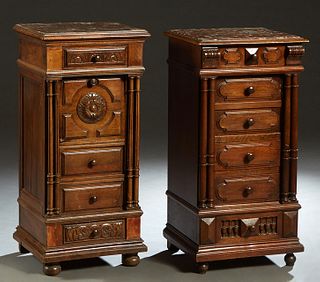 Near Pair of Henri II Style Carved Walnut Marble Top Nightstands, late 19th c., one with an inset figured dished brown marble over a frieze drawer and