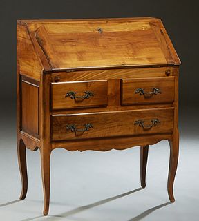 French Provincial Louis XV Style Carved Walnut Slant Front Desk, 20th c., the rectangular top over a serpentine slant lid with an inset gilt tooled le
