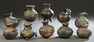 Group of Ten Pre-Columbian Style Pottery Vessels, 20th c., seven with relief decoration, Largest- H.- 7 1/2 in., Dia.- 5 1/2 in. Provenance: Palmira, 