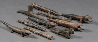 Group of Ten Pre-Columbian Style Pottery Items, 20th c., consisting of eight figural flutes and two figural pipes, Largest Flute- H.- 2 in., W.- 12 1/