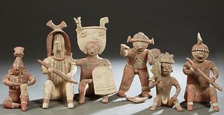 Group of Six Pre-Columbian Style Pottery Figures, 20th c., one standing, five seated, with painted decoration, H.- 14 1/2 in., W.- 10 in., Dia.- 8 in.