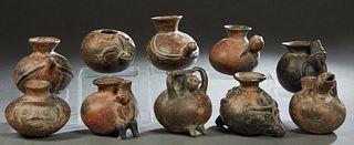 Group of Ten Pre-Columbian Style Pottery Vessels, 20th c., with relief figural animal decoration, Largest- H.- 6 1/4 in., W.- 6 in., D.- 7 1/4 in. Pro
