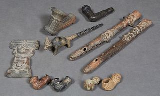 Group of Ten Pre-Columbian Style Pottery Pieces, 20th c., consisting of two flutes, seven pipe bowls and a flat figure. Provenance: Palmira, the Estat