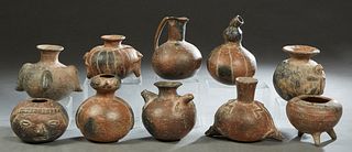 Group of Ten Pre-Columbian Style Pottery Vessels, 20th c., with relief figural or animal decoration, two of gourd form, Largest- H.- 8 1/2 in., Dia.- 