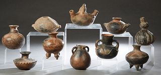 Group of Ten Pre-Columbian Style Pottery Vessels, 20th c., some with painted decoration, Gourd- H.- 8 1/4 in., Dia.- 5 1/2 in. Provenance: Palmira, th