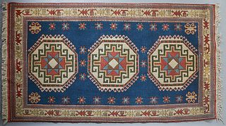 Caucasian Carpet, 4' 3 x 7' 3. Provenance: Palmira, the Estate of Sarkis Kaltakdjian (Sarkis Oriental Rugs), Prairieville, Louisiana.