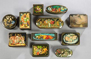 Group of Eleven Russian Hand Painted Black Lacquer Papier Mache Boxes, 20th c., consisting of a circular example of a woman beside a tree; one with an