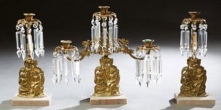 American Three Piece Bronze and Marble Girandole Set, 19th c., in the "teacher and student" model, consisting of a three light example and a pair of s