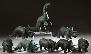 Group of Eight Patinated Bronze Figures, 20th c., consisting of a rhinoceros, six triceratops and a tyrannosaurus rex, T-Rex- H.- 18 in., W.- 16 in., 