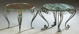 Near Pair of French Wrought Iron Cocktail Tables, 20th c., with scrolled and leaf legs, one with a green marble; the second with an eglomise mirror to