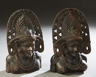 Pair of Carved Ebony Busts, 20th c., of a man and a woman in pierced headdresses, H.- 16 in., W.- 9 1/2 in., D.- 5 1/2 in. Provenance: Palmira, the Es