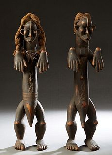 Pair of African Carved Wood Fertility Figures, 20th c., with woven cloth "hair," H.- 26 in., W.- 6 1/2 in., D.- 6 in. Provenance: Palmira, the Estate 