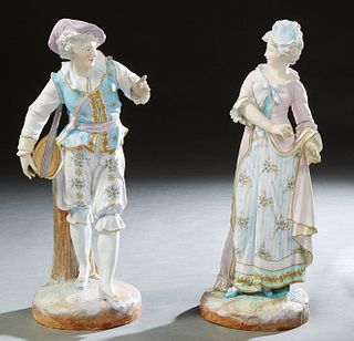 Pair of Large Continental Polychromed Bisque Figures, 20th c., of a couple in 18th c, costumes, the undersides with a stamped anchor mark, She- H.- 18