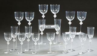 Eighteen Piece Set of Lalique Crystal Stemware, 20th c., consisting of 6 red wines, 6 white wines, and 6 champagne flutes, in the "Roxane" pattern, wi