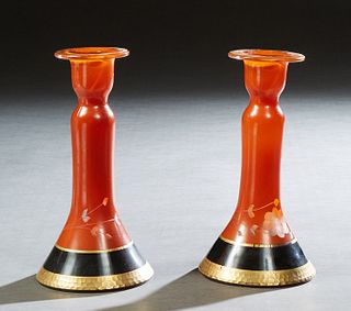 In the Manner of Charles Schneider, Pair of Art Deco Cut Glass Candlesticks, early 20th c., of tapered form, in orange with black and gilt banding, H.